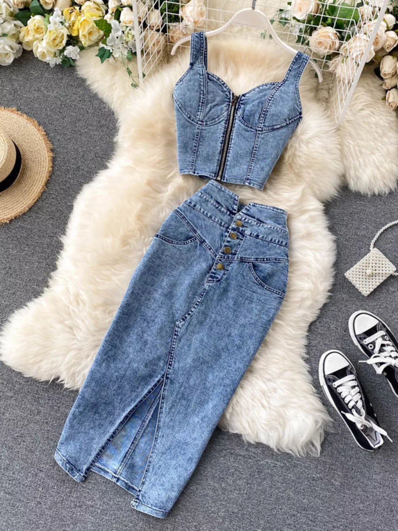 Trendsi denim skirt set featuring a zipper top and button slit skirt, styled together in a casual, modern look.