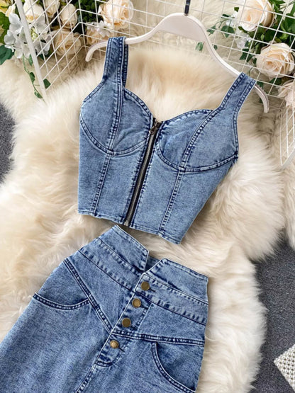 Trendsi denim skirt set with zipper top and button slit design, featuring a stylish matching jacket and skirt ensemble.