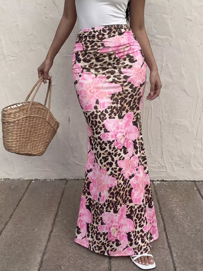Blush pink leopard print bodycon maxi skirt by Trendsi, showcasing a fitted, long-length skirt with bold animal print design.