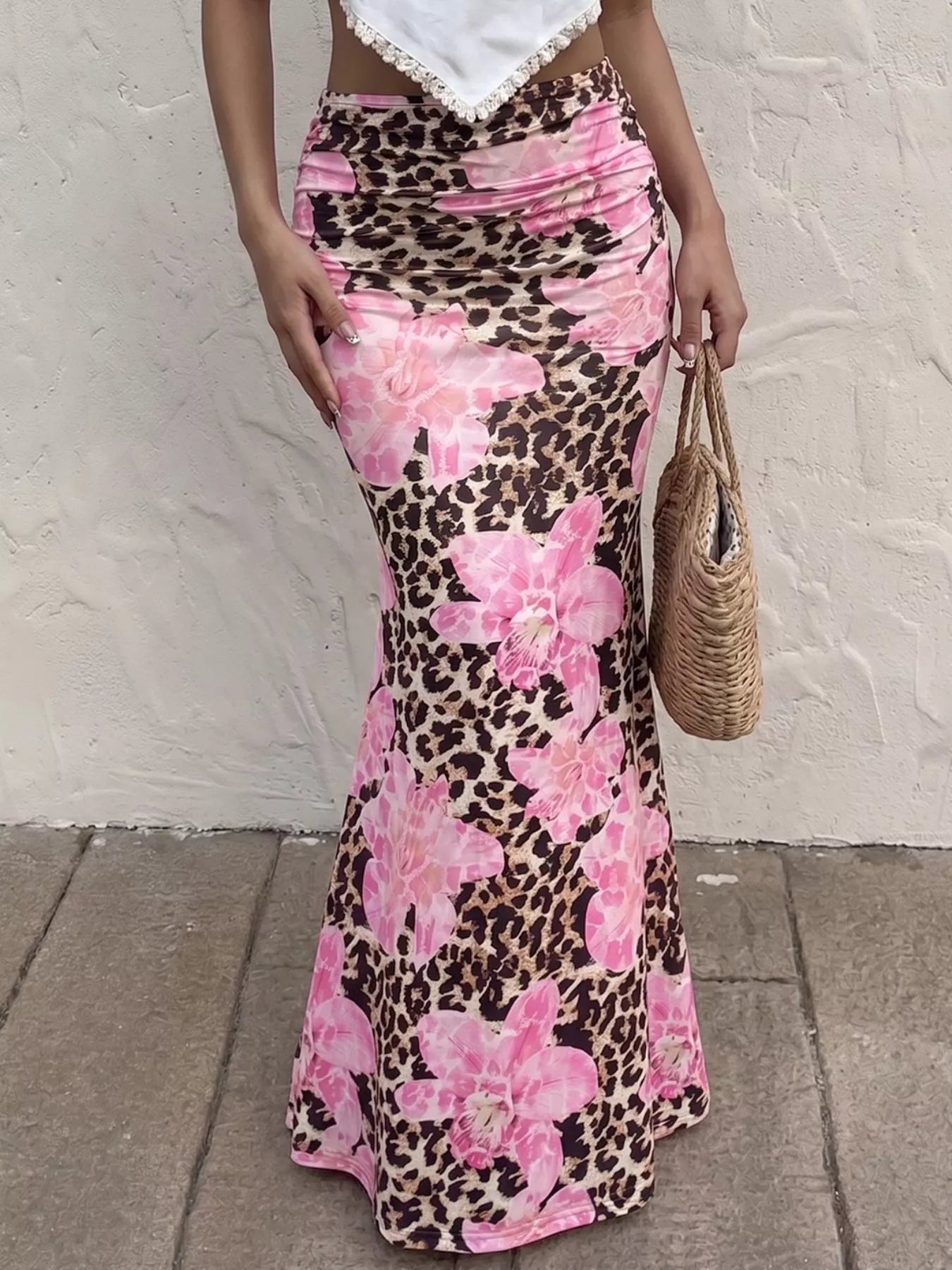Blush pink leopard print bodycon maxi skirt by Trendsi, featuring a fitted silhouette and stylish animal print fabric.