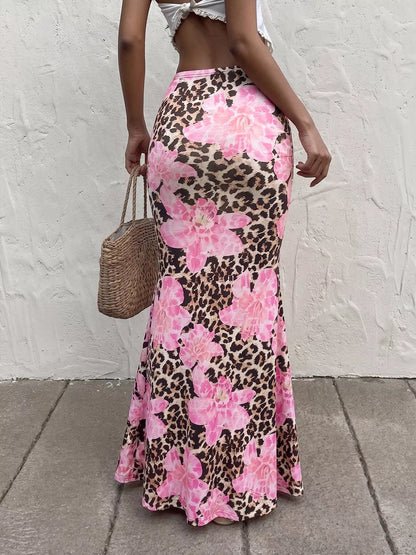 Blush pink leopard print bodycon maxi skirt from Trendsi, featuring a fitted silhouette and bold animal pattern.