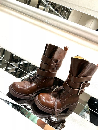Brown buckled leather block heel boots with ankle straps and stylish design, perfect for trendy fall and winter outfits.