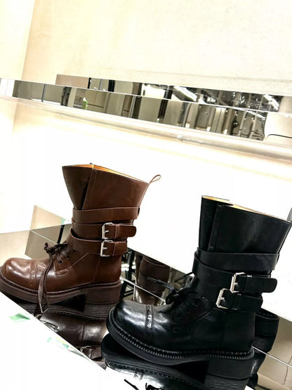 Brown Trendsi buckled leather block heel boots with ankle straps and side buckles, stylish and versatile for various outfits.
