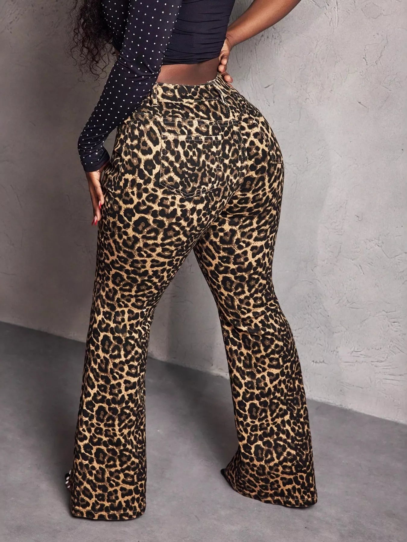 Trendsi brown leopard print wide-leg pants with a relaxed fit and high waist, shown on a model.