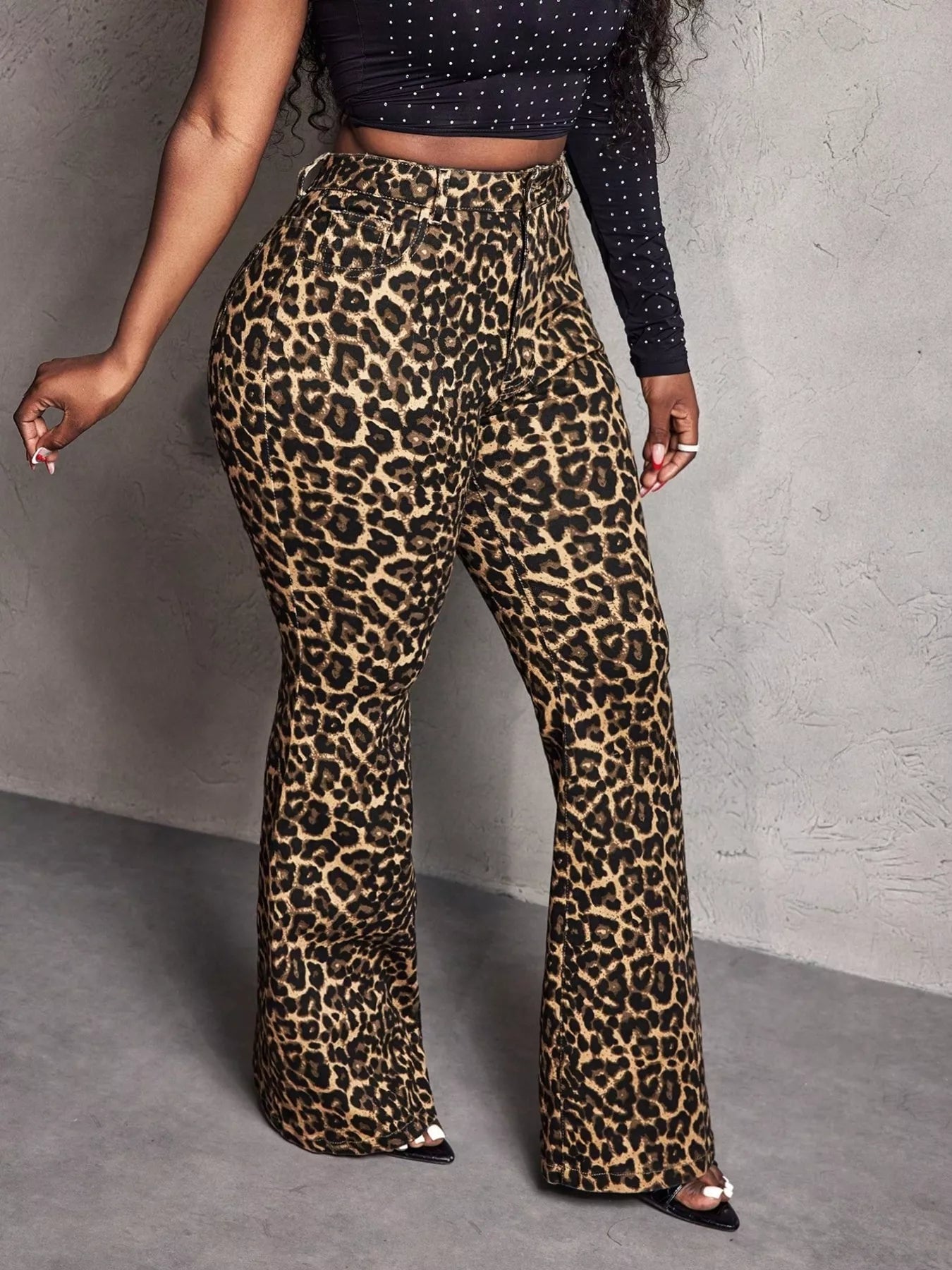 Brown leopard wide leg pants from Trendsi featuring a flowy, relaxed fit and stylish animal print design.