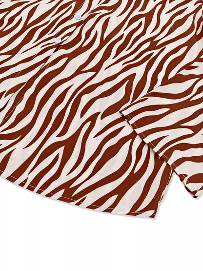 Zebra print relaxed fit top and pants two-piece set by Trendsi, showing the stylish matching animal print outfit on a model.