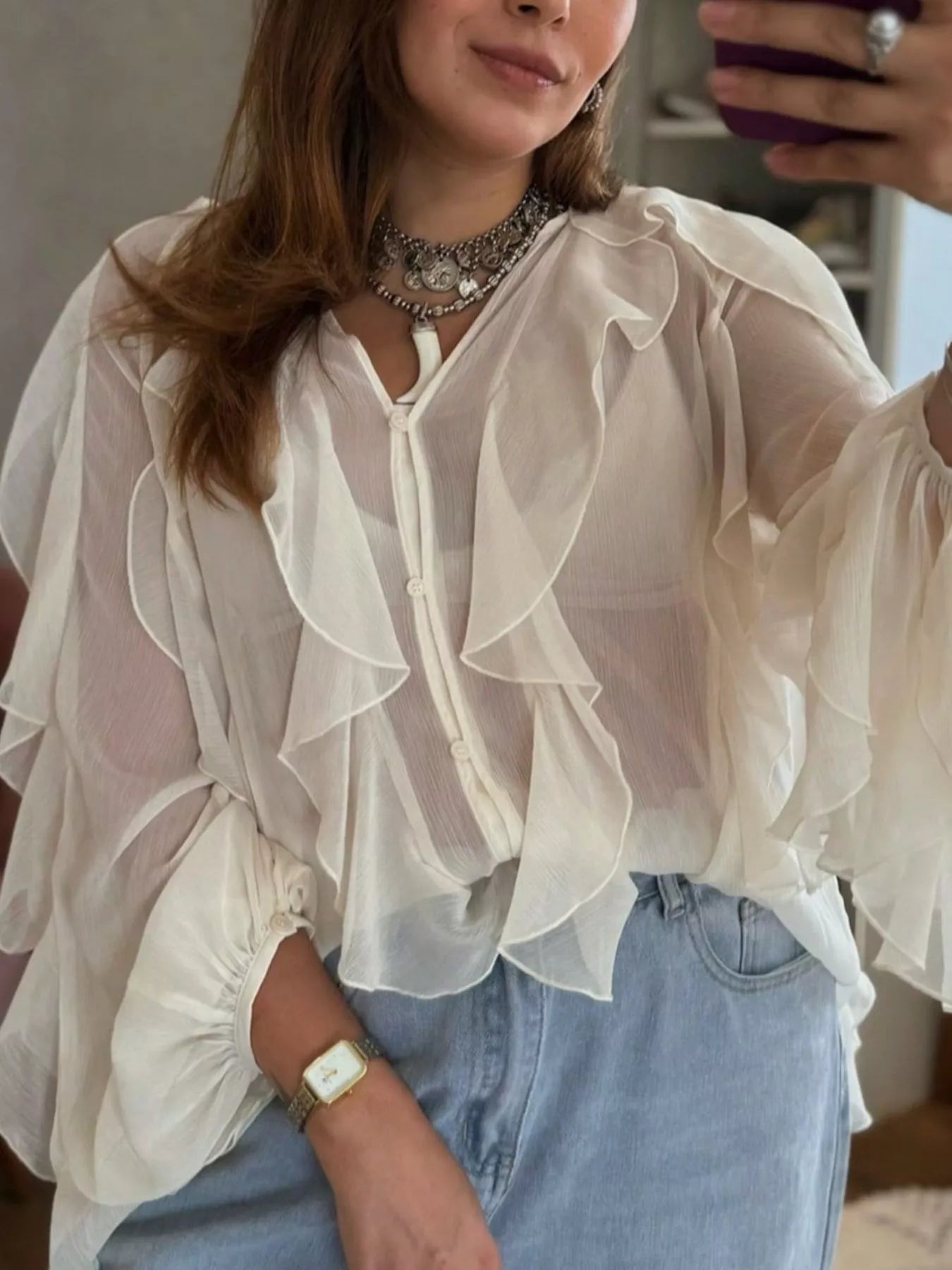 Brown ruffled sheer long sleeve blouse from Trendsi, featuring lightweight fabric and feminine design.