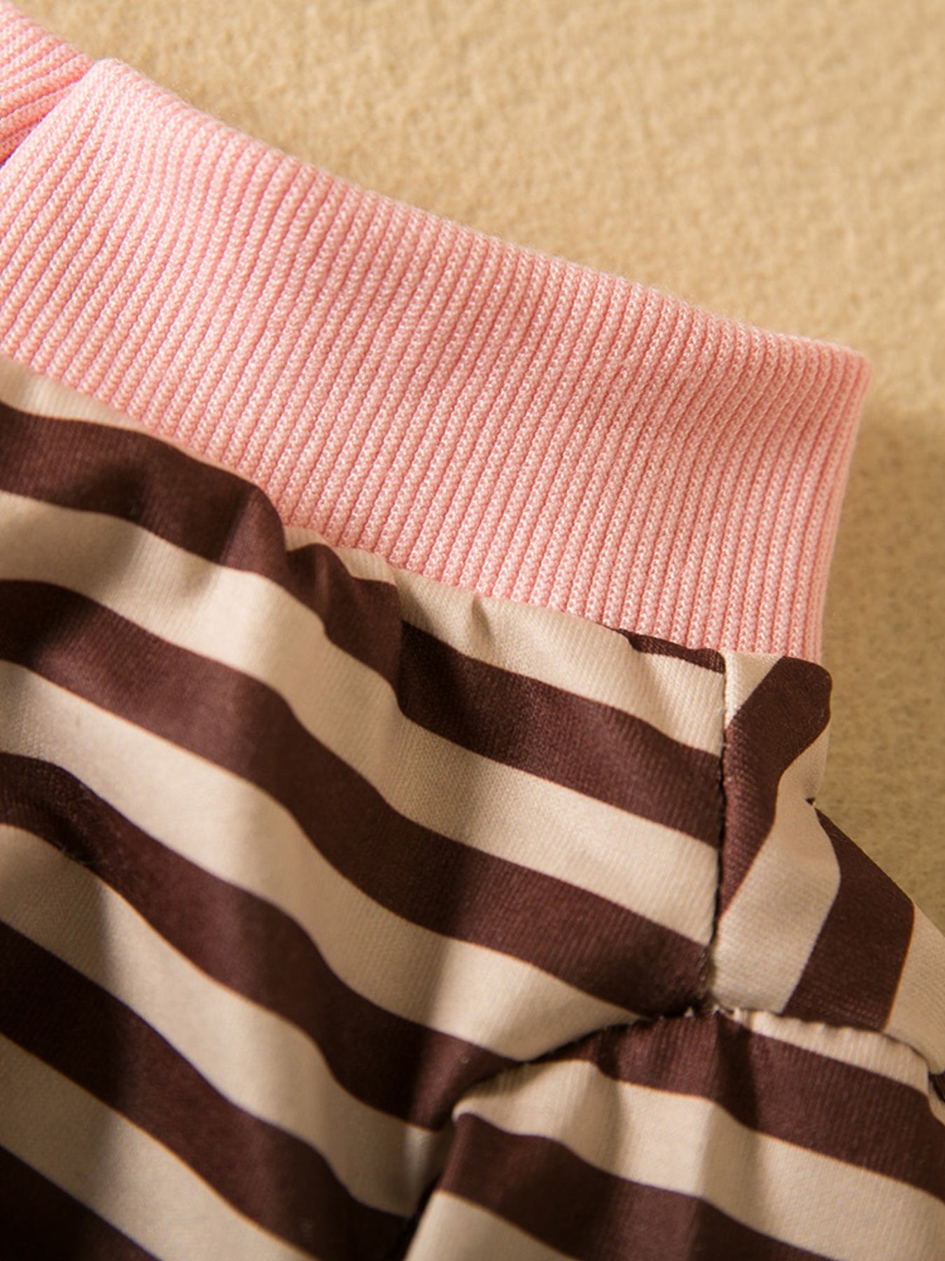 Brown striped heart patch pet top by Trendsi, featuring a cute design with a striped pattern and heart detail.