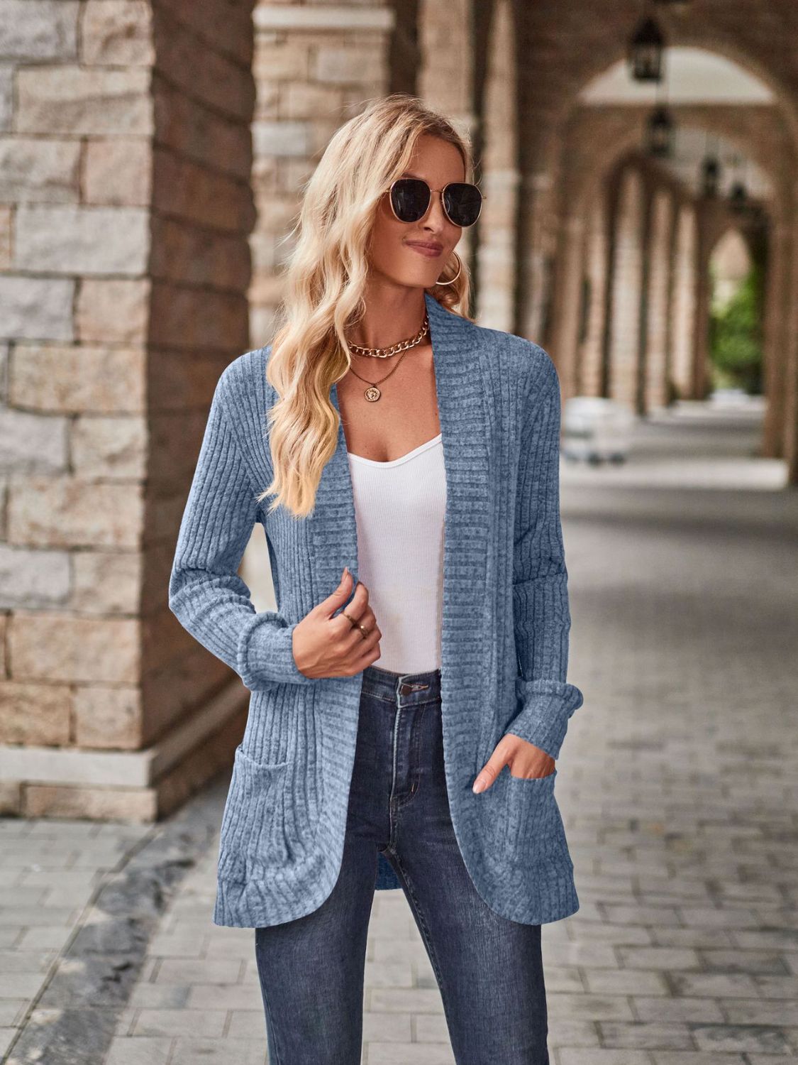 Burgundy open front cardigan with pockets from Trendsi, styled with long sleeves and a relaxed fit for casual wear.