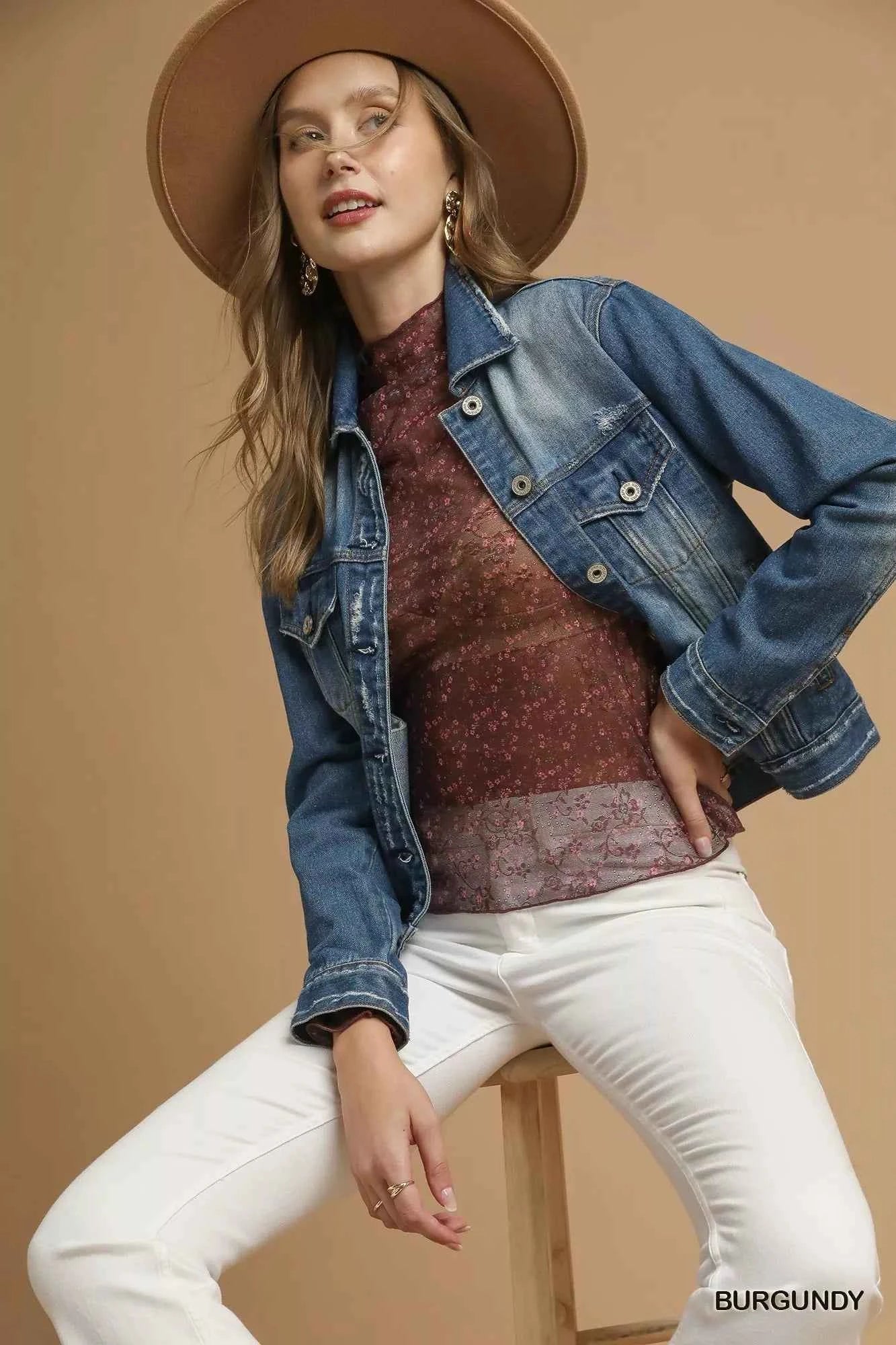 Umgee nylon lace mesh long sleeve top with intricate lace details and a sheer, stylish design.