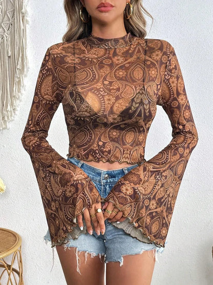 Printed camel-colored mock neck long sleeve cropped T-shirt by Trendsi, featuring a stylish pattern and fitted design.