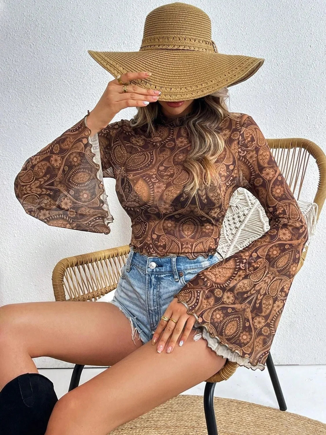 Printed mock neck long sleeve cropped T-shirt by Trendsi in camel color, featuring a stylish design and fitted silhouette.