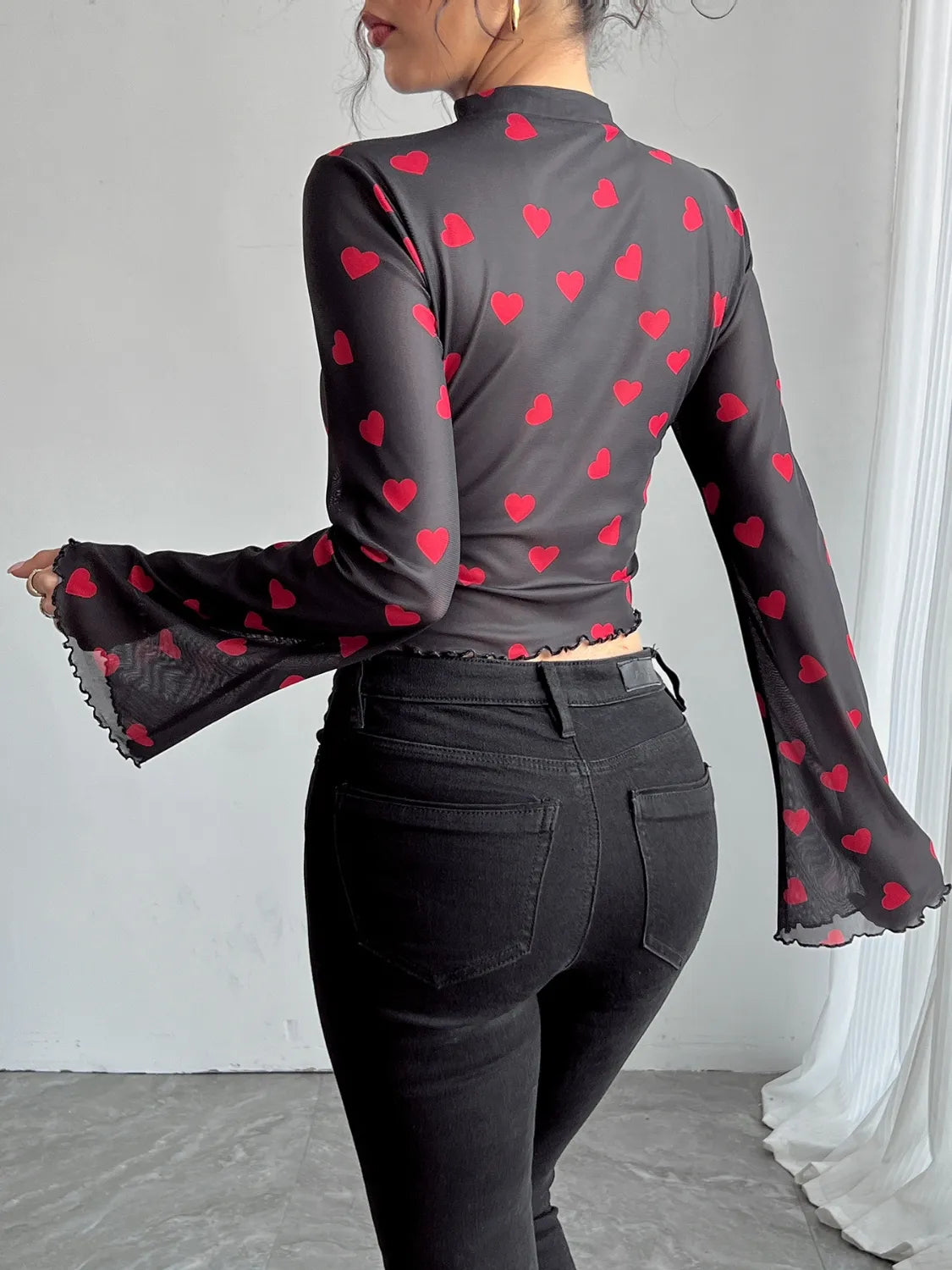 Camel printed mock neck long sleeve cropped T-shirt from Trendsi, featuring a fitted design and stylish pattern.