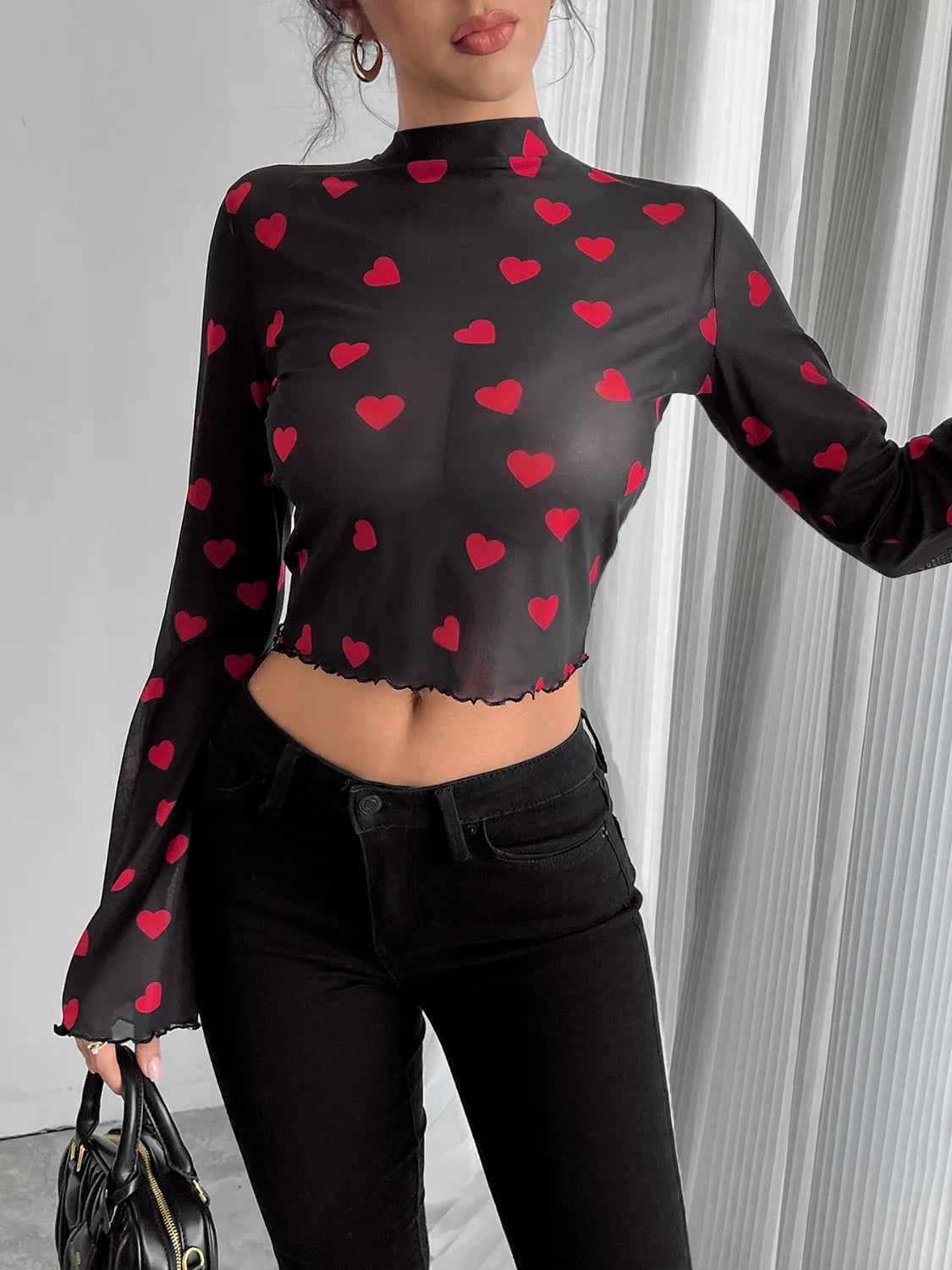 Camel-colored printed mock neck long sleeve cropped T-shirt by Trendsi, featuring a fitted design and stylish pattern.