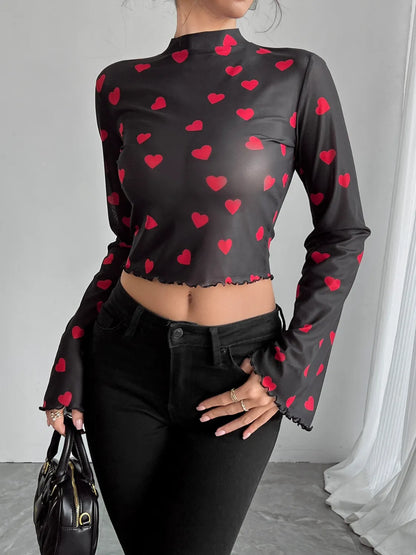 Camel printed mock neck long sleeve cropped T-shirt by Trendsi, showcasing a fitted design with a stylish pattern.