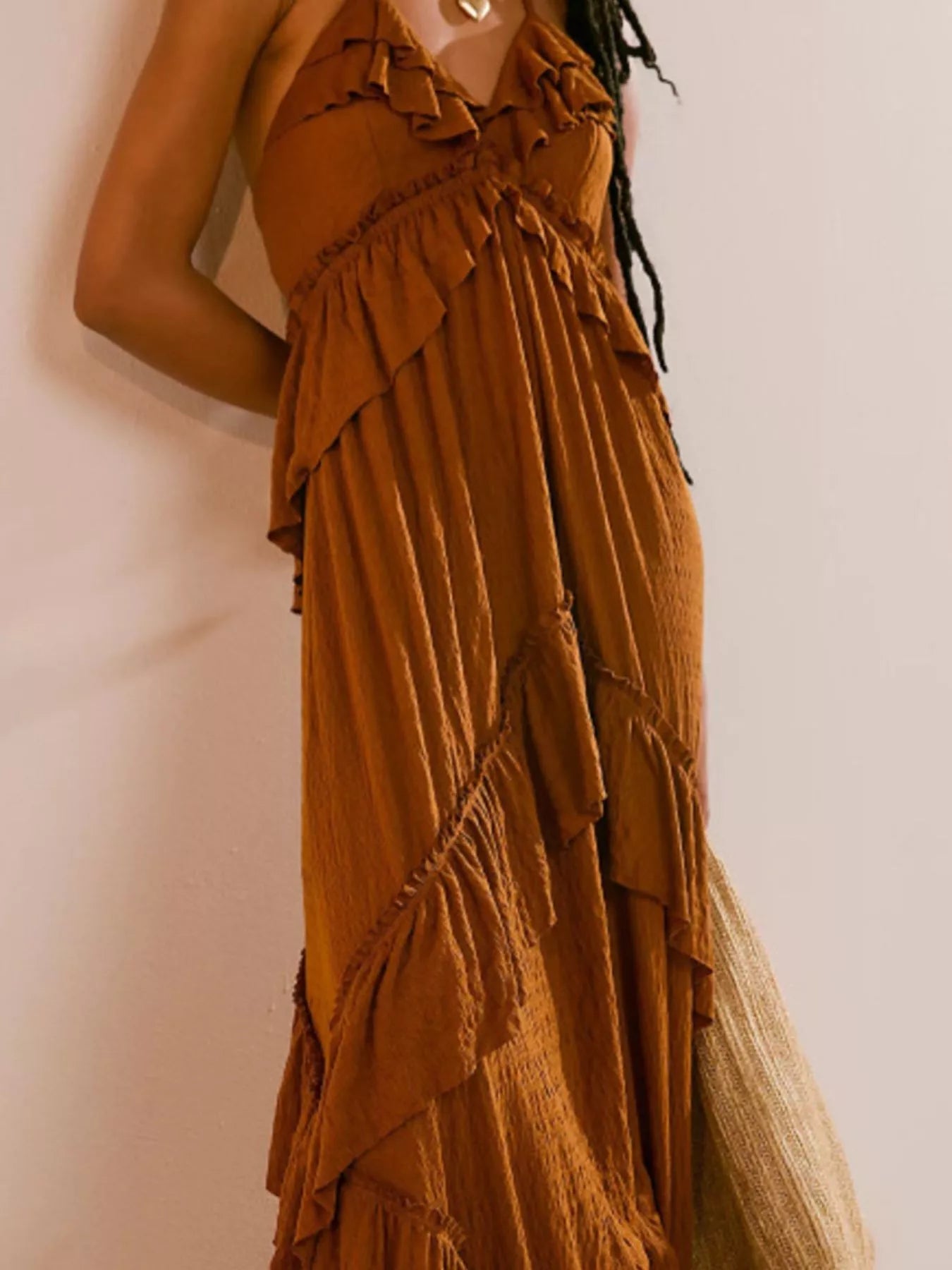 Ruffled halter neck maxi dress by Trendsi featuring a flowing silhouette and elegant ruffle details, perfect for summer occasions.