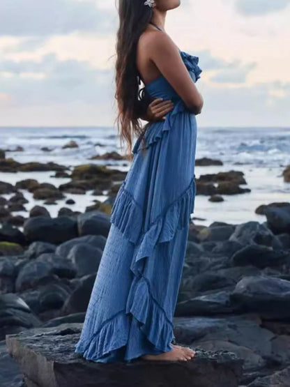 Ruffled halter neck maxi dress by Trendsi featuring a flowing silhouette and elegant ruffle details in a stylish design.