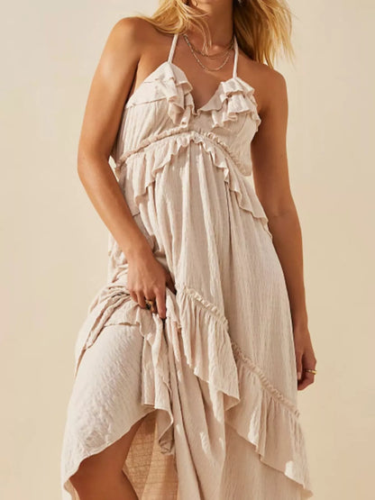 Ruffled halter neck maxi dress by Trendsi, featuring a flowing silhouette, ruffle details, and elegant design for summer wear.