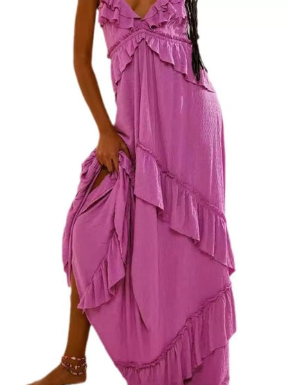 Ruffled halter neck maxi dress by Trendsi featuring flowy fabric, tiered ruffles, and a flattering silhouette perfect for summer wear.
