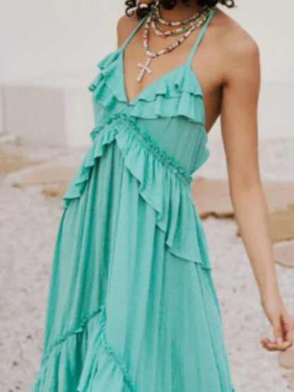 Ruffled halter neck maxi dress by Trendsi featuring a flowing silhouette and layered ruffle details.