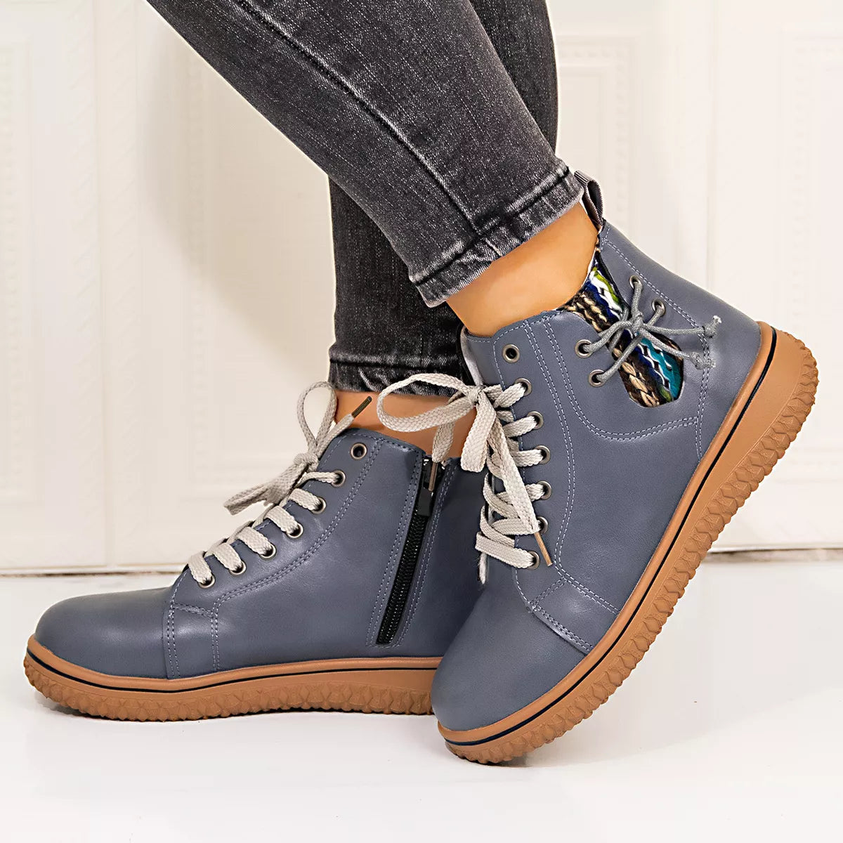 Coffee brown lace-up ankle boots with zipper detail, trendy Trendsi footwear, featuring stylish laces and functional zipper accents.