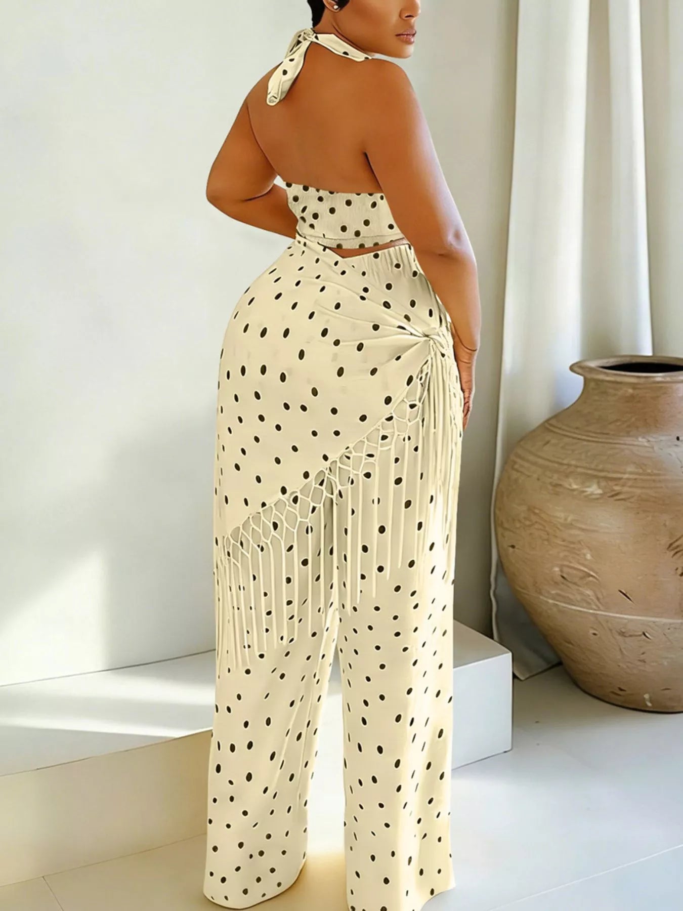 Cream polka dot halter neck cami and fringe trim pants set by Trendsi, stylish two-piece outfit with playful details.