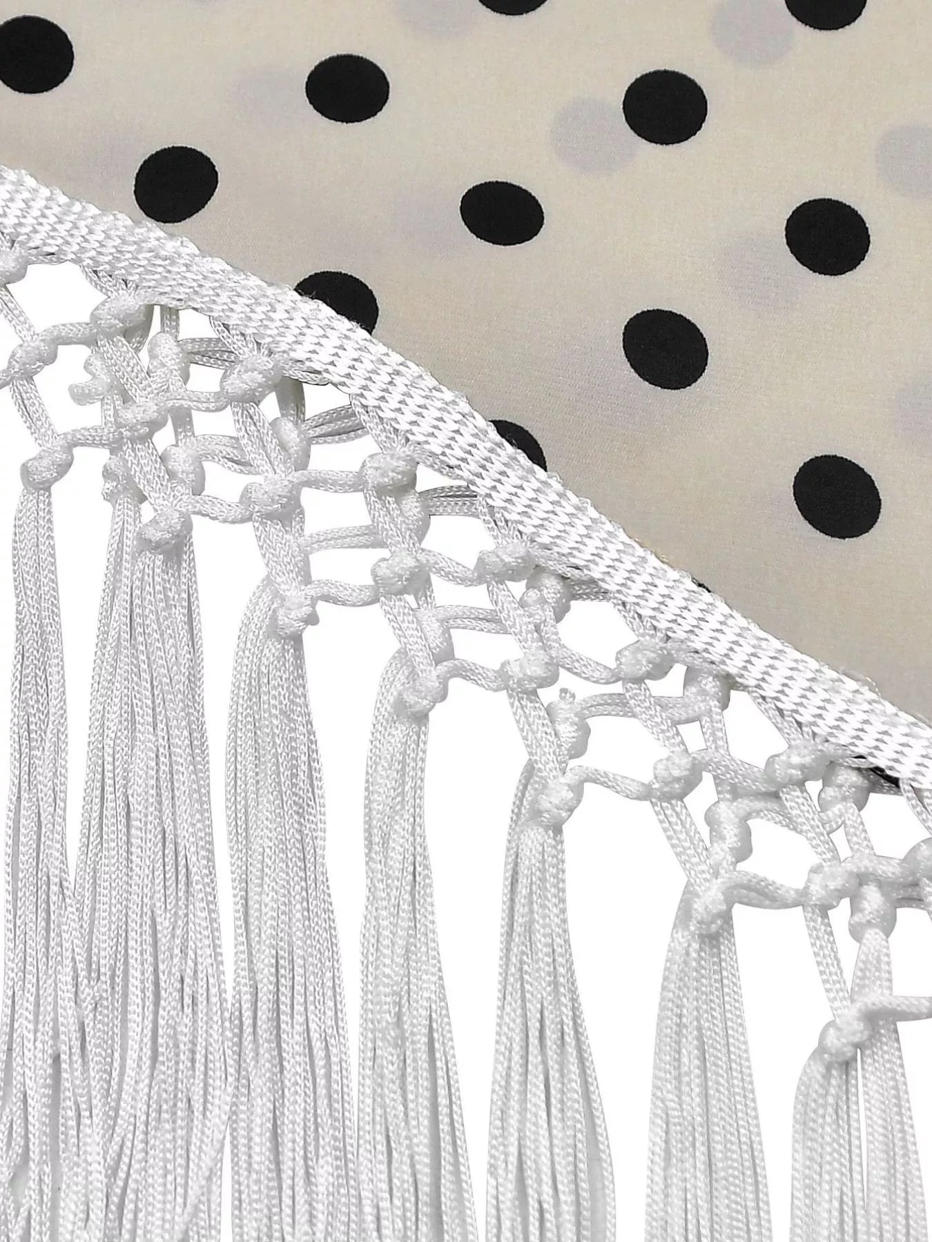 Cream polka dot halter neck cami and fringe trim pants set by Trendsi, featuring a stylish, coordinated summer outfit.