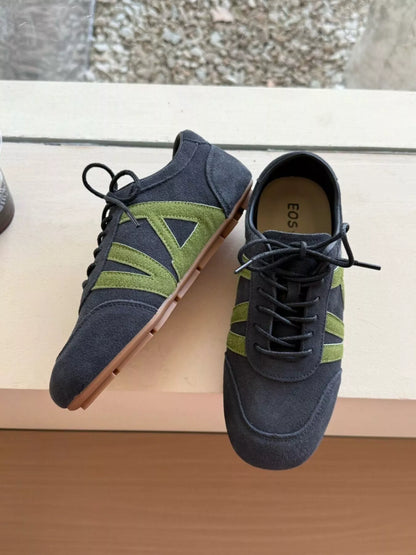 Dark blue casual lace-up sneakers from Trendsi featuring comfortable design and white rubber soles.