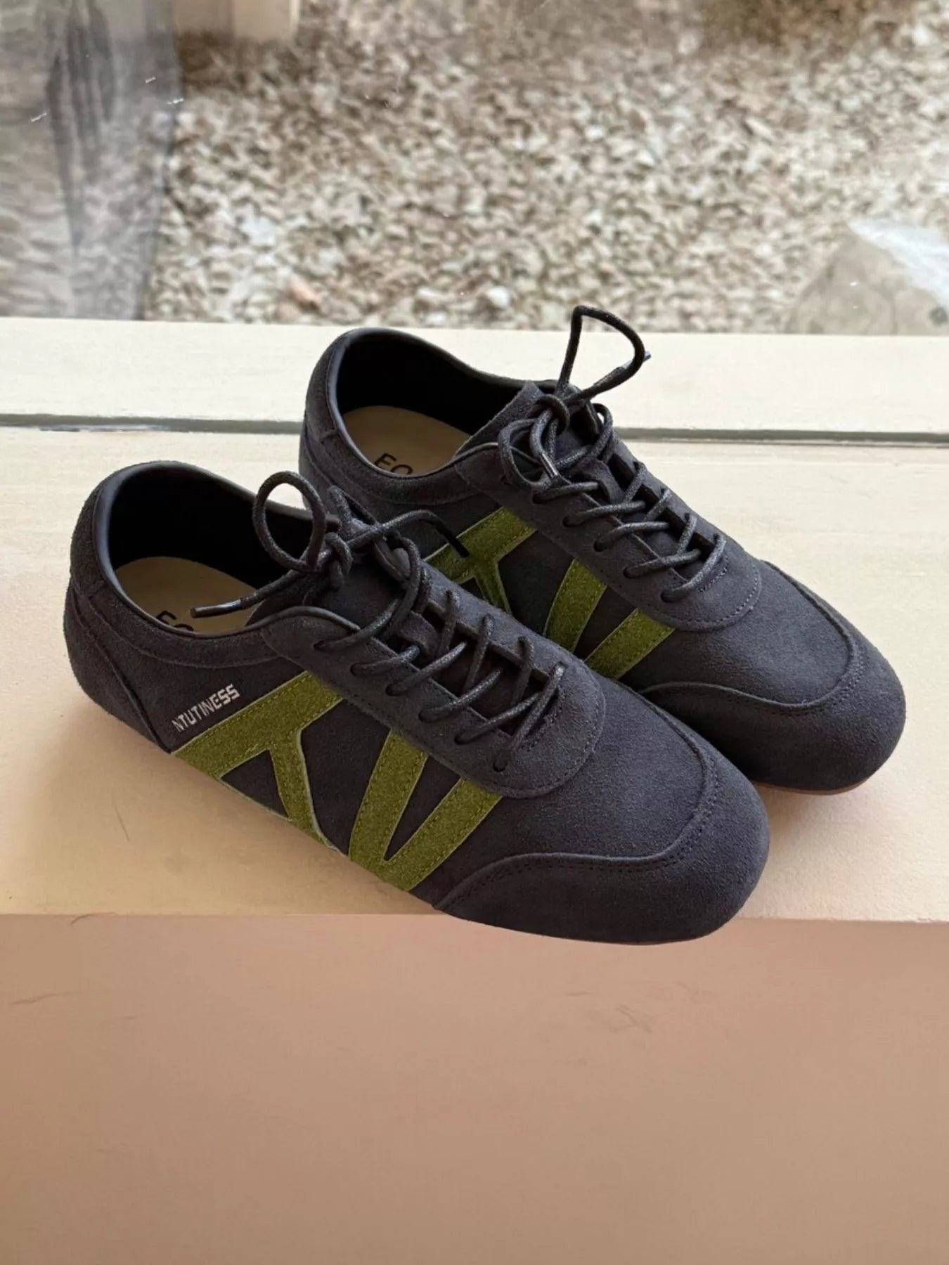 Dark blue casual lace-up sneakers by Trendsi, featuring a stylish design and comfortable fit for everyday wear.