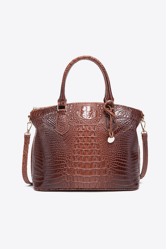 Trendsi PU leather handbag with top handle and silver hardware, stylish accessory for casual or formal outfits.