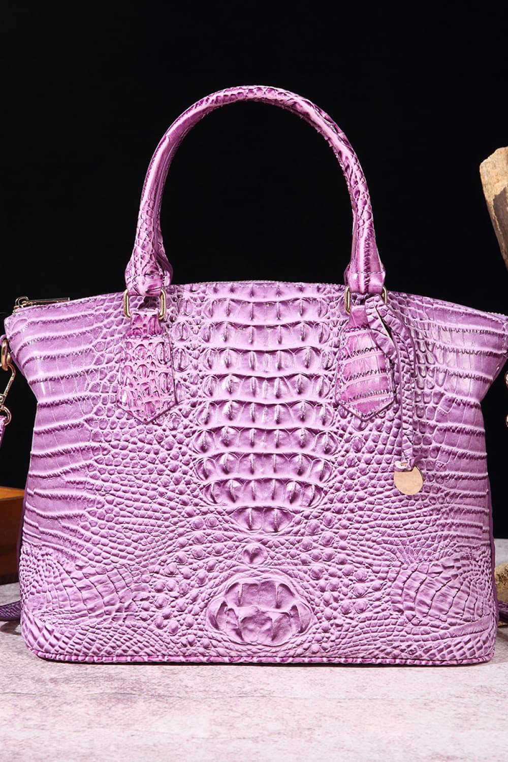 Trendsi PU leather handbag with gold-tone hardware, featuring a structured design and top handle for stylish carrying.