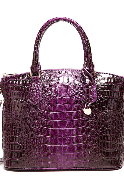 Trendsi PU leather handbag featuring a sleek design with top handles and a structured silhouette, perfect for everyday use.
