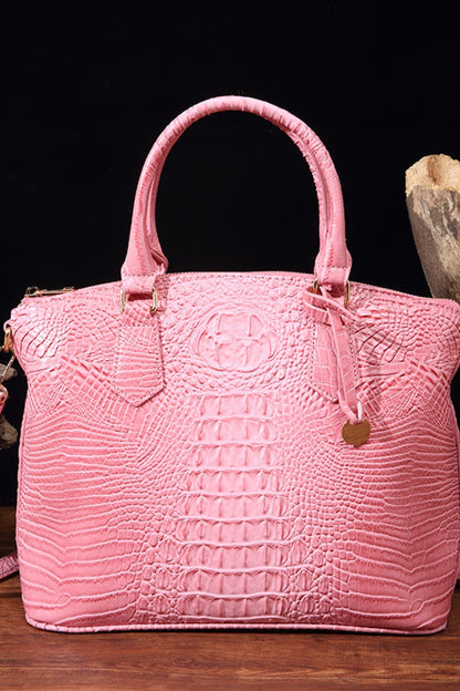 Trendsi PU leather handbag with sleek design, featuring sturdy handles and a spacious interior, perfect for everyday use.