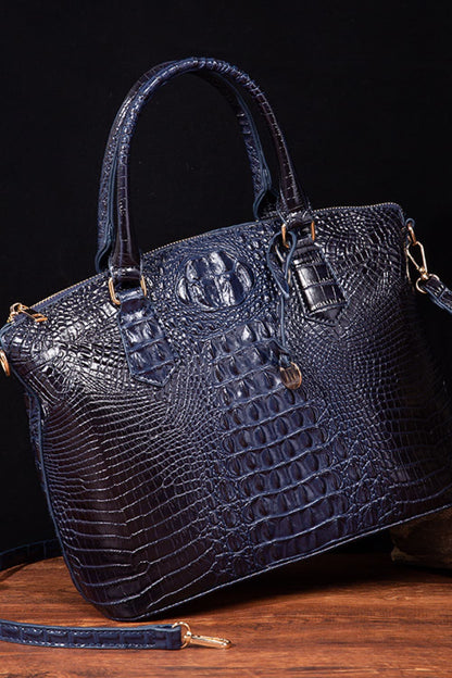 Trendsi PU leather handbag with double handles and zip closure, featuring a sleek, stylish design perfect for everyday use.