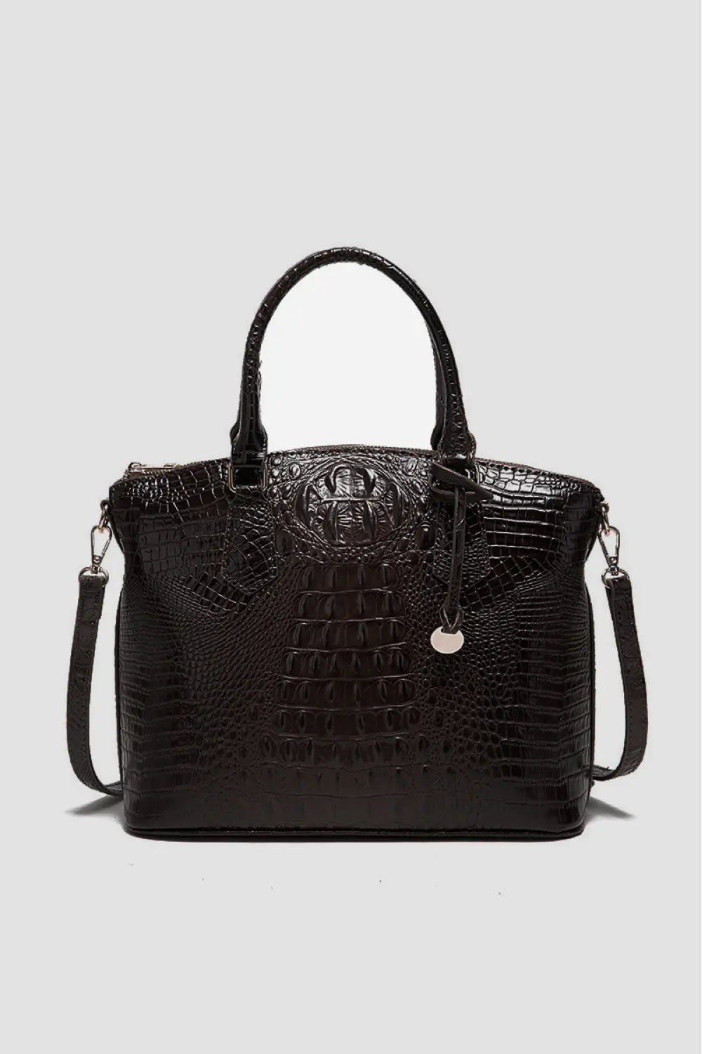 Trendsi PU leather handbag with sleek design, featuring a top handle and spacious interior for stylish everyday use.