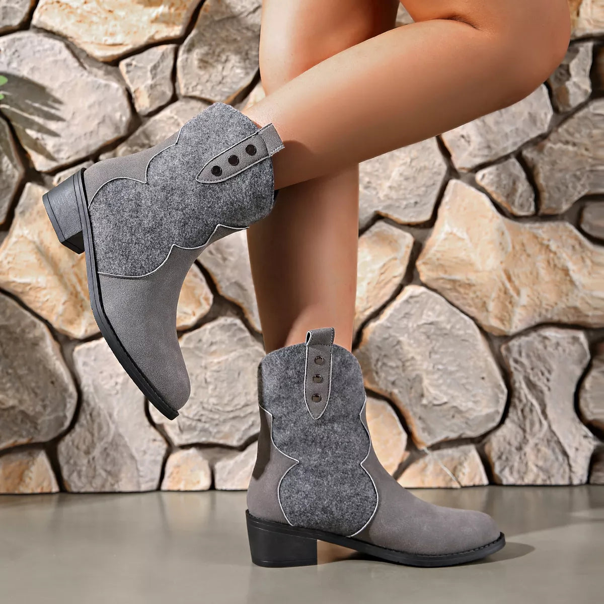 Dark gray point toe block heel boots by Trendsi, stylish ankle-high footwear with a sleek design and sturdy heel.