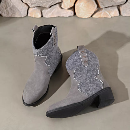 Dark gray point toe block heel boots from Trendsi, stylish footwear with a sleek design and sturdy heel for versatile wear.