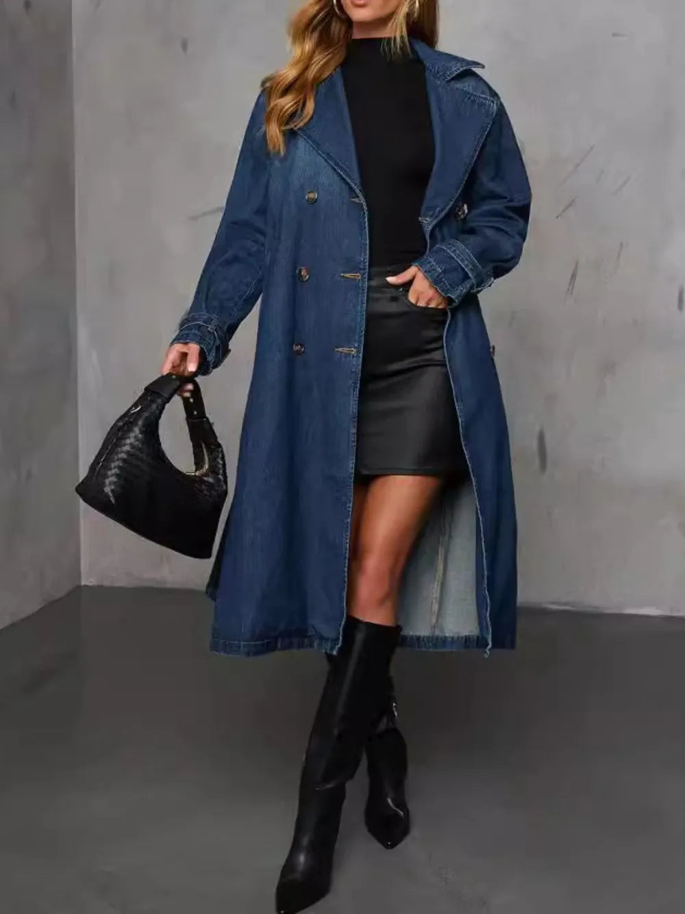 Dark wash button-up long sleeve denim jacket by Trendsi, featuring a longline style and classic collar for casual wear.