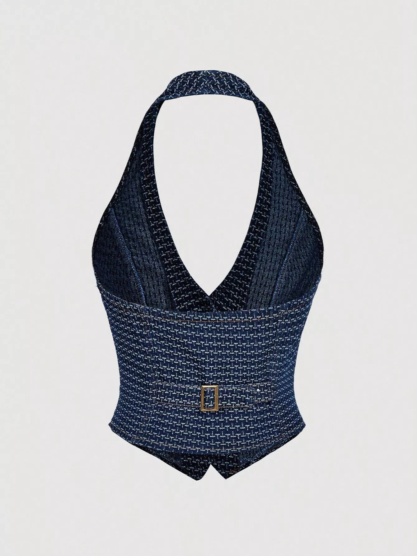 Dark wash halter neck denim vest and wide-leg jeans set by Trendsi, styled together for a casual, trendy look.