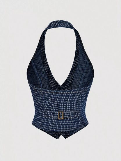 Dark wash halter neck denim vest and wide-leg jeans set by Trendsi, styled together for a casual, trendy look.