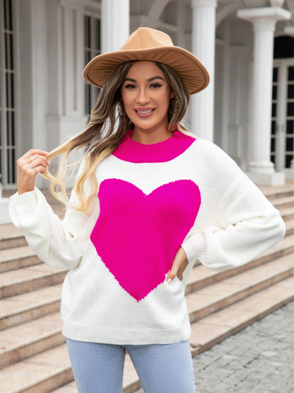 Deep red angel wings and heart graphic sweater by Trendsi, featuring a cozy knit fabric and stylish design.