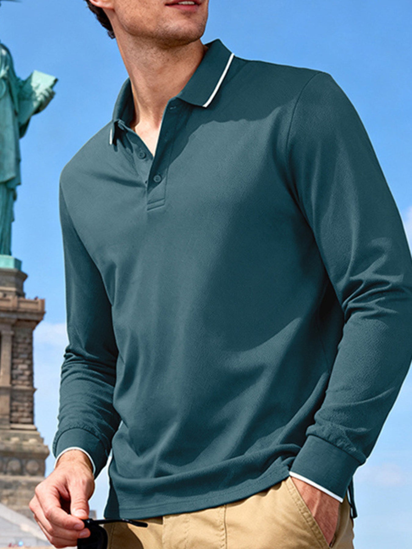 Men's deep teal full-size long-sleeve polo shirt with contrast trim by Trendsi, showcasing a classic style and plus size fit.