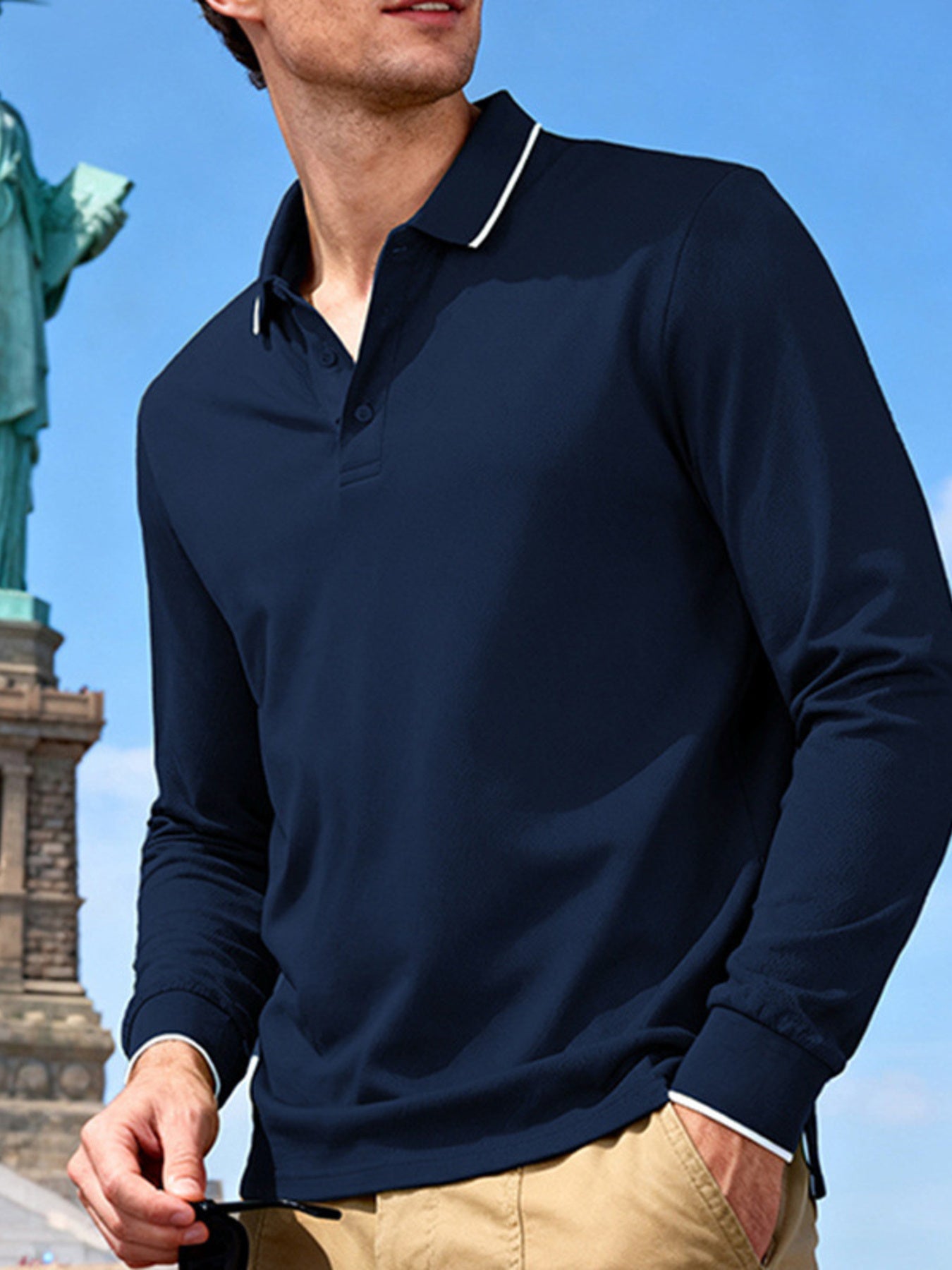 Men's full-size classic long-sleeve polo shirt with contrast trim in deep teal, by Trendsi, shown on a plain background.