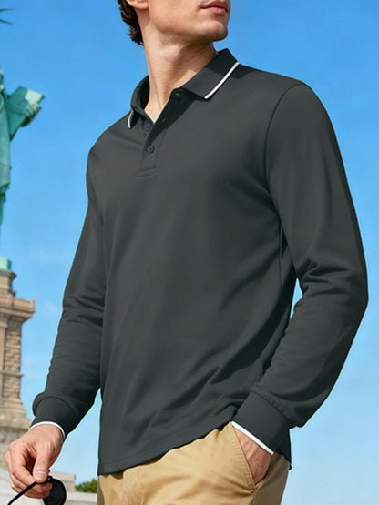 Men's full-size classic long-sleeve polo shirt by Trendsi in deep teal with contrast trim, displayed on a hanger.