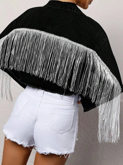Black cropped denim jacket with fringe details and button-up front from Trendsi, styled for a casual, trendy look.