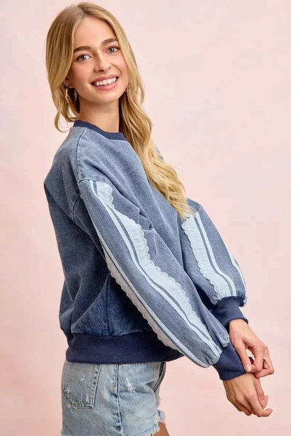 BiBi washed denim sweatshirt by Trendsi featuring lace contrast sides and casual, stylish fit.