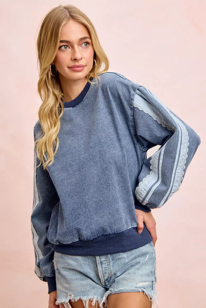 Trendsi BiBi washed denim sweatshirt with lace contrast sides, featuring a casual fit and stylish denim and lace details.