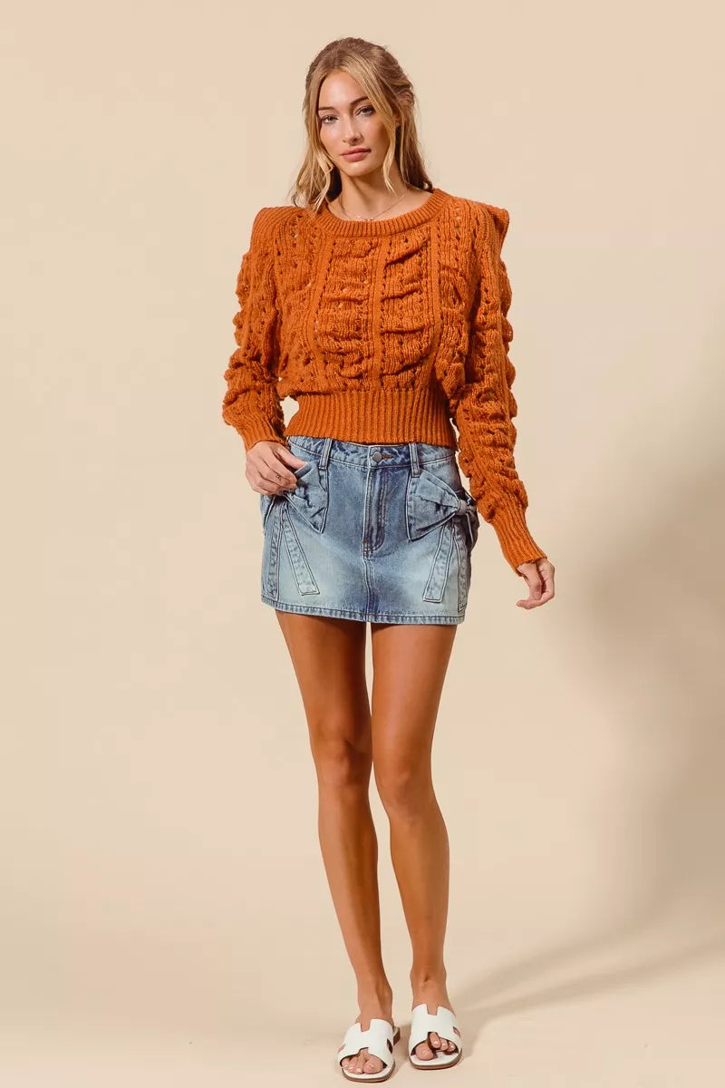 Trendsi SO ME Bow Knot Pocket Denim Mini Skirt showing a stylish blue denim skirt with bow knot detail and side pockets.