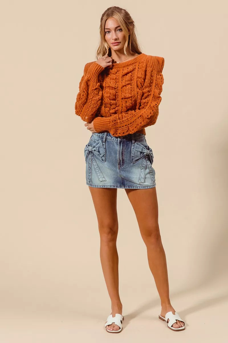 Trendsi SO ME bow knot pocket denim mini skirt featuring a stylish fit and classic blue denim fabric.