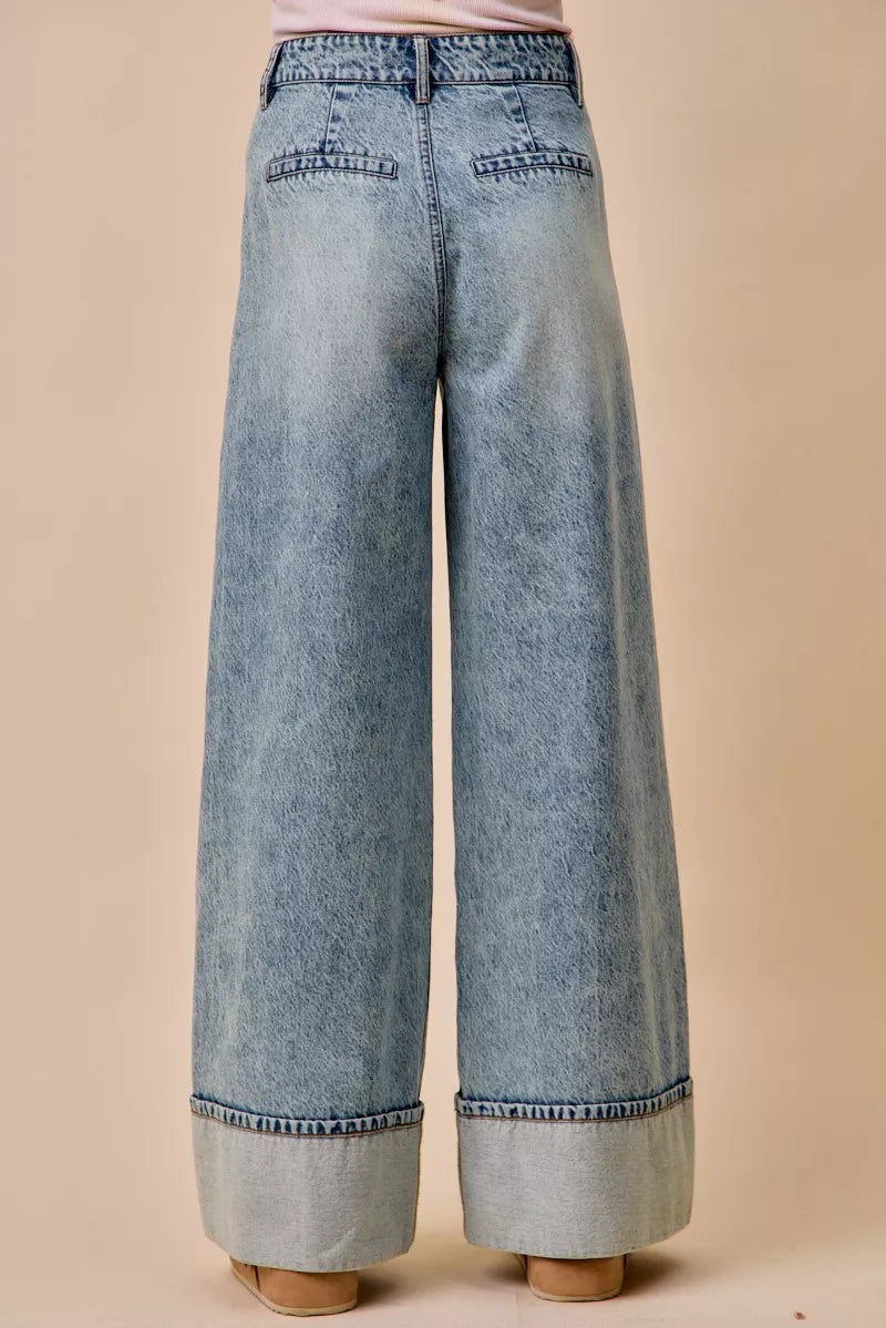 Mid-rise plated wide-leg denim jeans by Trendsi, showcasing the stylish cut and detailing of the trendy denim pants.